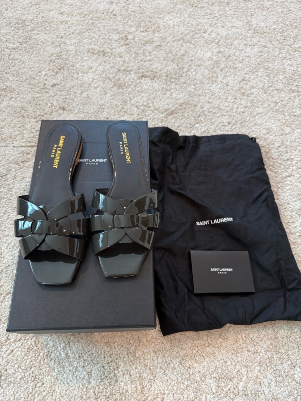 Saint Laurent Tribute Leather Slides.